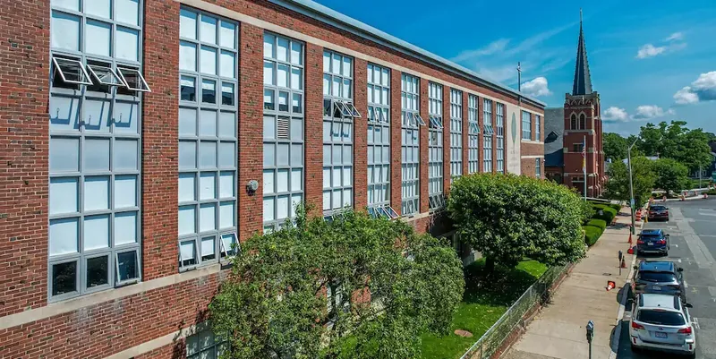 A high school building on a sunny day